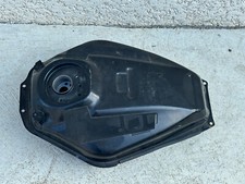 UN RESERVOIR CARBURANT NU MOTO