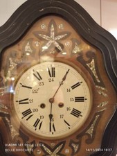 pendule murale oeil de boeuf