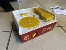 FISHER PRICE MUSIC BOX TOURNE