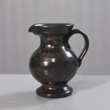 Small glazed terracotta pitcher by Jean Marais France 20th century