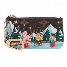 Louis Vuitton Monogram Vivienne Pochette Cure M82620 Brown Coin Purse