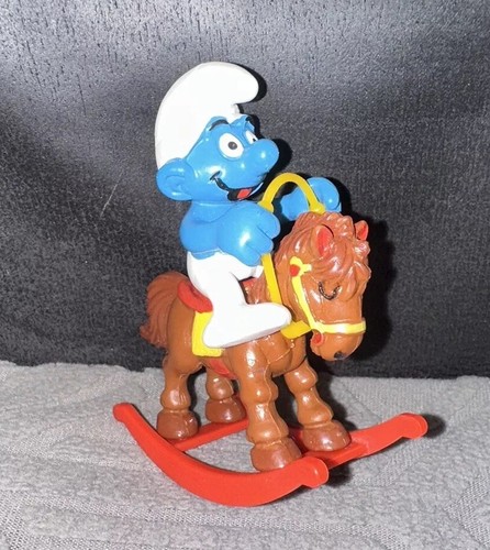 Schtroumpf cheval bascule - à,