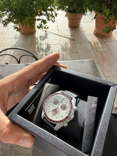 Swatch omega - omega, x