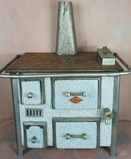 Cuisinière poupée jouet