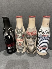 4 Bouteilles Coca Cola COLLECTOR JEAN PAUL GAULTIER pleines,jamais ouvertes Neuv