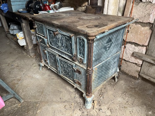 Ancien poêle fonte - en,