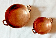 2 petits poêlons en cuivre