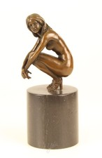 Sculpture nude woman sitting in bronze on a black marble base after Claude