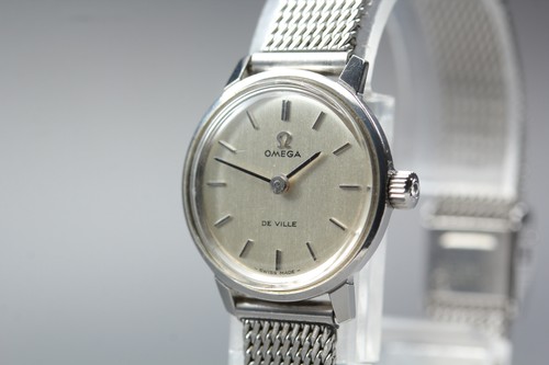 Comme neuf montre - [n, neuf]