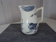 Cruche ancienne , faïence