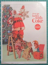 1965 Coca-Cola Coke print ad Santa decorates Christmas tree