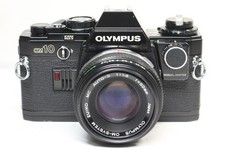 Appareil photo reflex argentique 35 mm Olympus OM10 + objectif Auto-S 50 mm F...