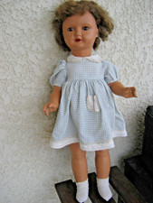 Jolie  poupée BELLA CAPI