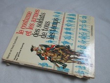 Le costume et les armes des