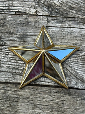 Etoile miroir mural doré