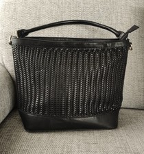 Sac à main tressé U collection