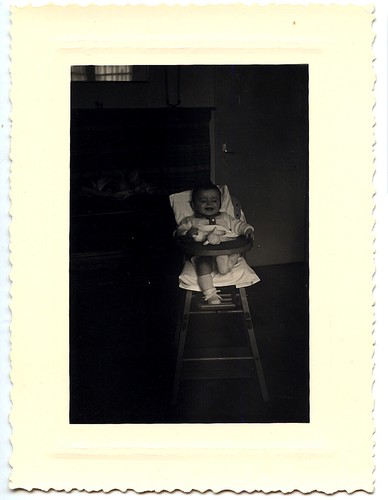 Enfant sur chaise - haute,