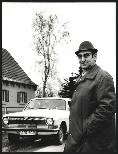 Photographie homme debout - , à