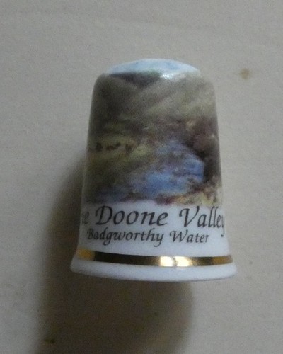 Dé coudre porcelaine - à,