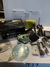 Nikon Coolpix S1100pj 14 MP Digital Camera 5x Wide Angle built-in projector