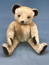 Ours en peluche Pintel, vers