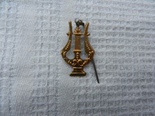 insigne clique lyre musique