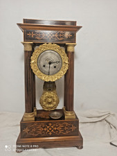 Grande pendule  portique palissandre,marqueterie bronze dore fonctionne sonne