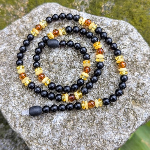 Collier perles ambre la - de,