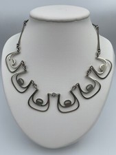 COLLIER FANTAISIE DESIGN ALLIAGE 22 GRAMMES 6 FORMES STYLISEES SAC A MAIN W539