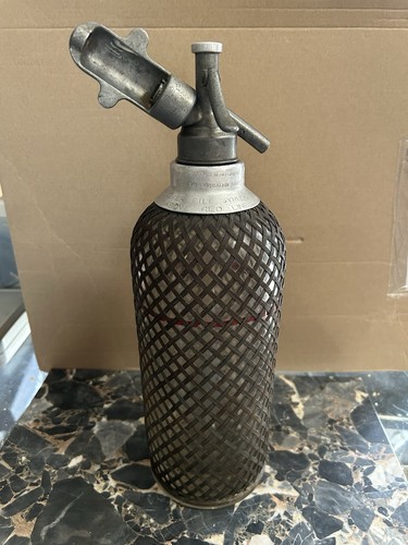 Ancien siphon grillagé - siphon,