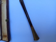 antique cigarette smoke, amber and brass in case