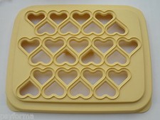 Ravioles party modèle coeurs de TUPPERWARE  / comme neuf