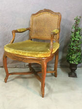 Fauteuil canné style Louis XV (XVIIIeme ) en noyer a entretoise et dossier plat