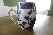 Ancienne chope en porcelaine