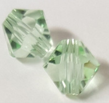 site parisien...20 PERLES TOUPIES SWAROVSKI  5mm   CHRYSOLITE  