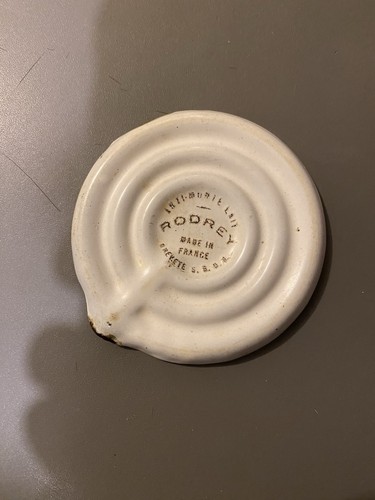 Ancien anti monte - lait, en