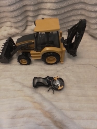 Vends tractopelle radio - vends,