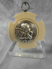 Ancienne médaille de berceau