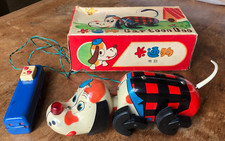 Jouet ancien + boîte d'origine  "CARTOON DOG" tôle lithographiée Fonctionne TBE.