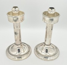 Paire bougeoirs à ressort