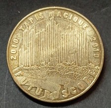 MÉDAILLE FUTUROSCOPE TAPIS