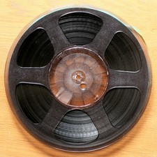 BANDE MAGNETIQUE REVOX (?) AVEC BOBINE PLASTIQUE NO NAME • 26.5 CM • OCCASION