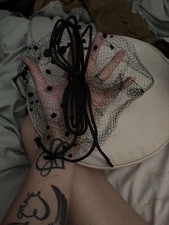 French veil voilette embellished with a draped velvet ribbon bow.