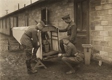 c. 1916 WWI Soldiers Examining Cutaway Fuselage with Aerial Camera Photo