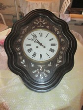 pendule oeil de boeuf