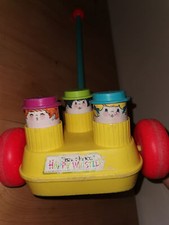 Jouet à pousser  fisher price 1976