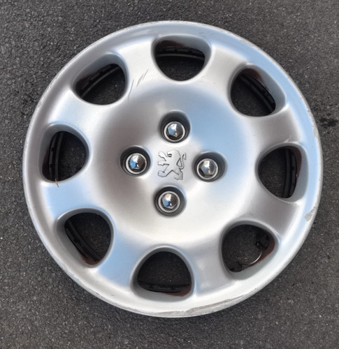 Enjoliveur quartz peugeot - 1,