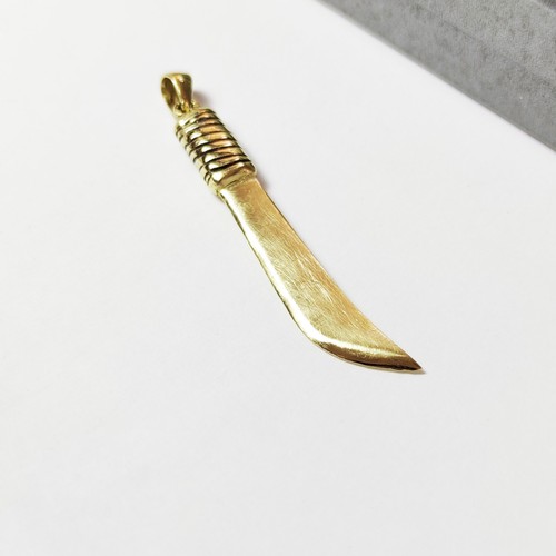 Pendentif machette bijoux