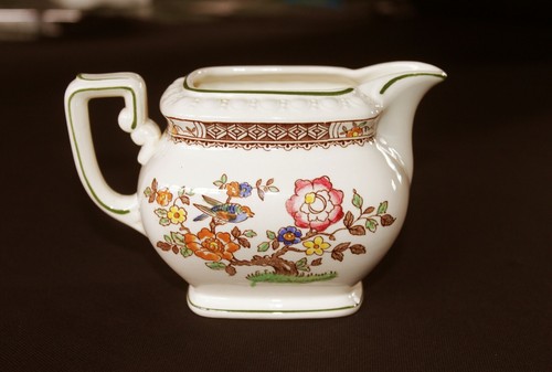 Pot lait faïence de - à, en