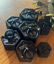 Lot de 7  Poids en fonte de